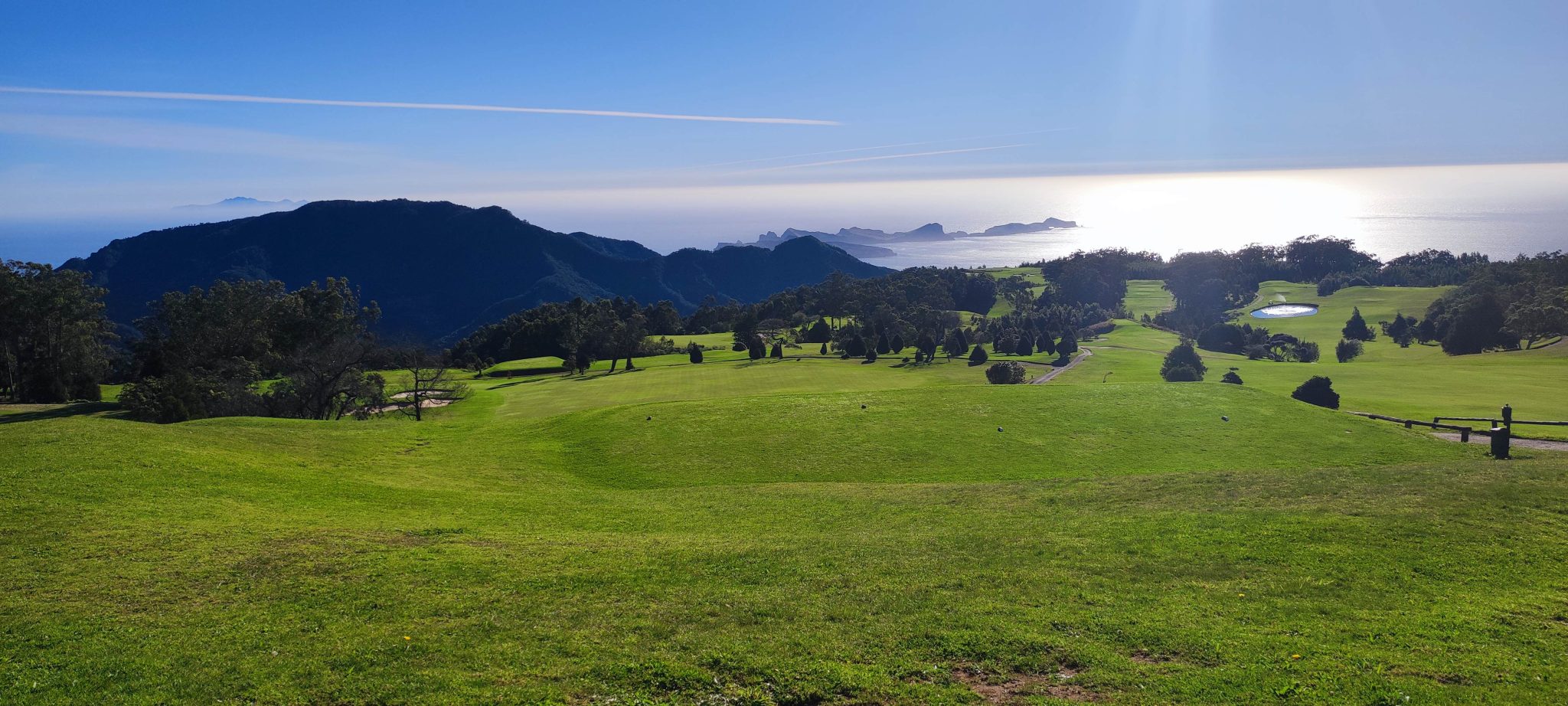 Elevated golf course view with cart path